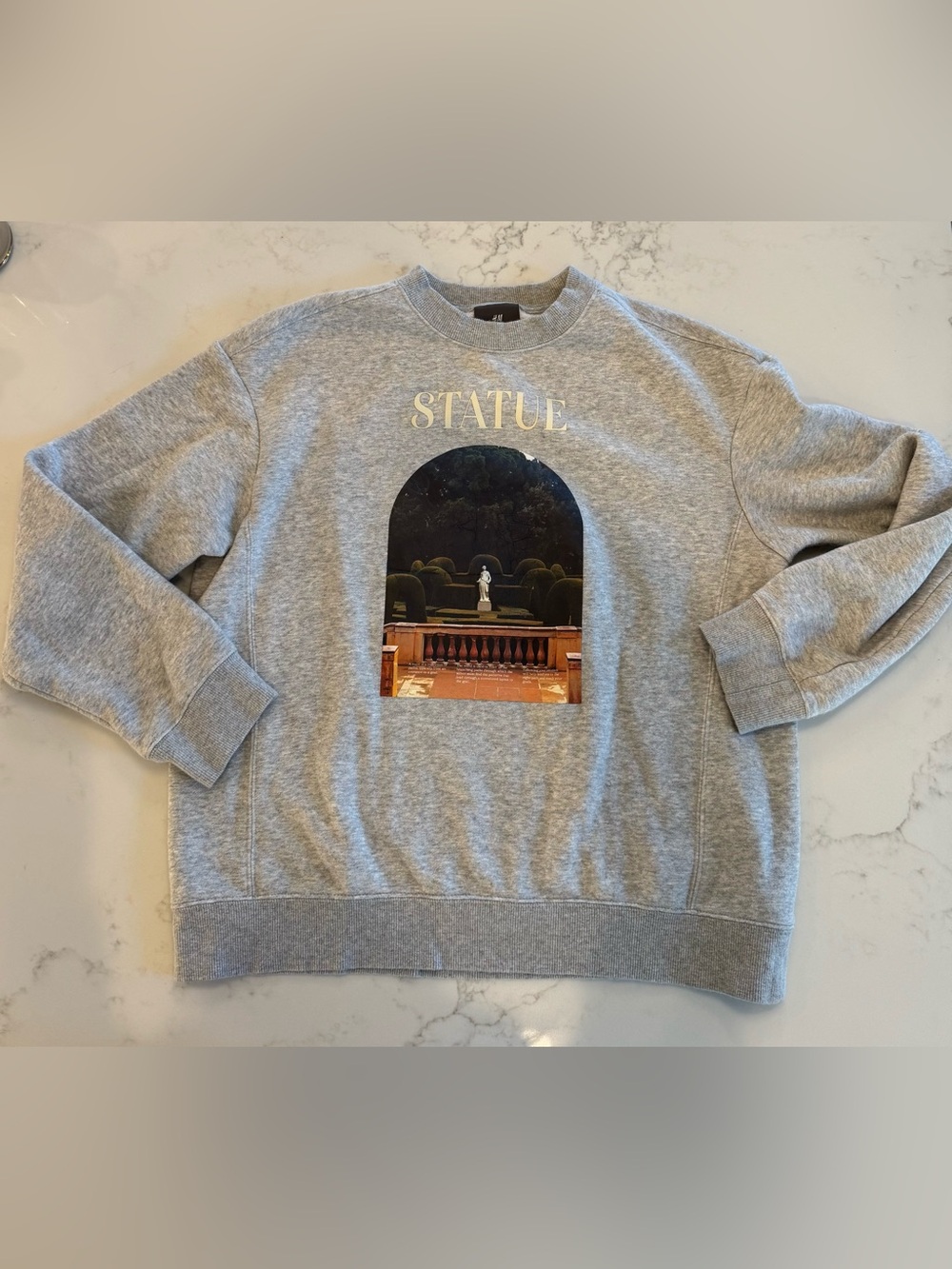 H&M Gray Crewneck Sweatshirt with 'STATUE' Graphic